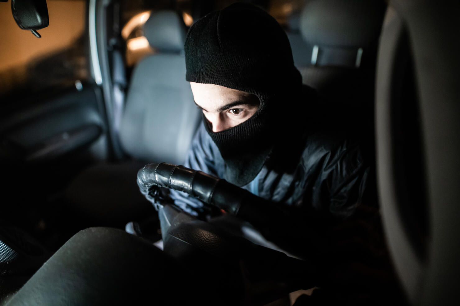 Thief escaping with stolen car