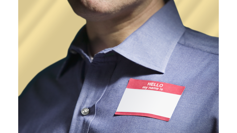 Man Wearing "Hello My Name Is" Tag