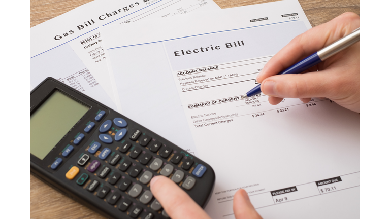 Electric bill charges paper form on the table