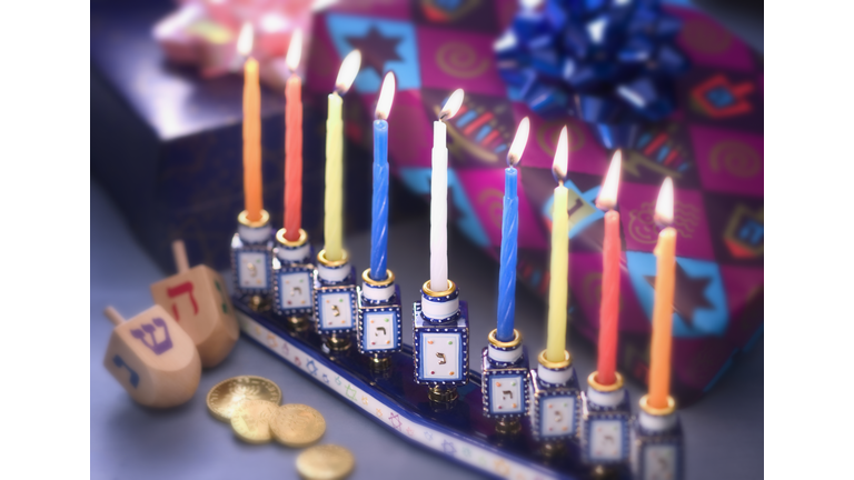 Lit Menorah and Hanukkah Presents