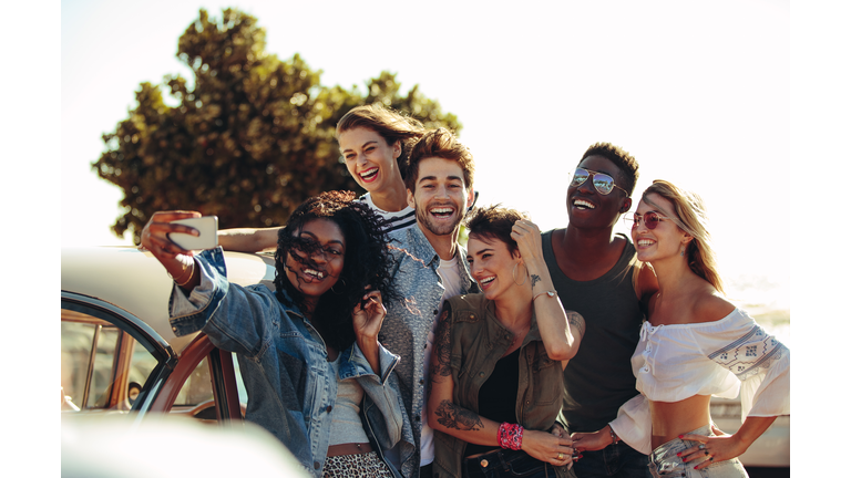 Posing for a road trip selfie