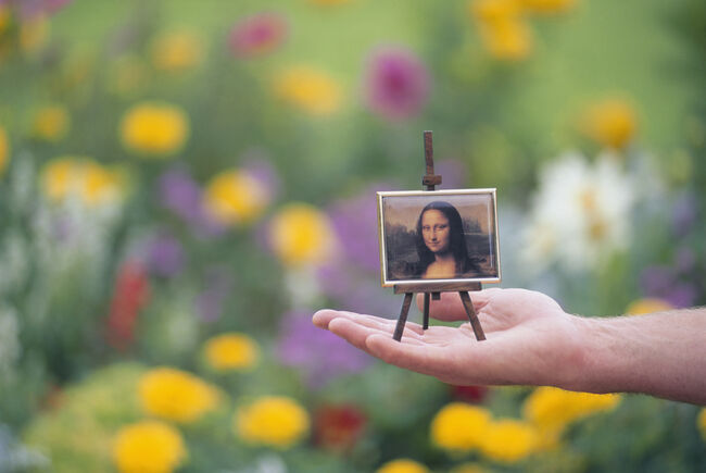 Person with Mona Lisa Picture