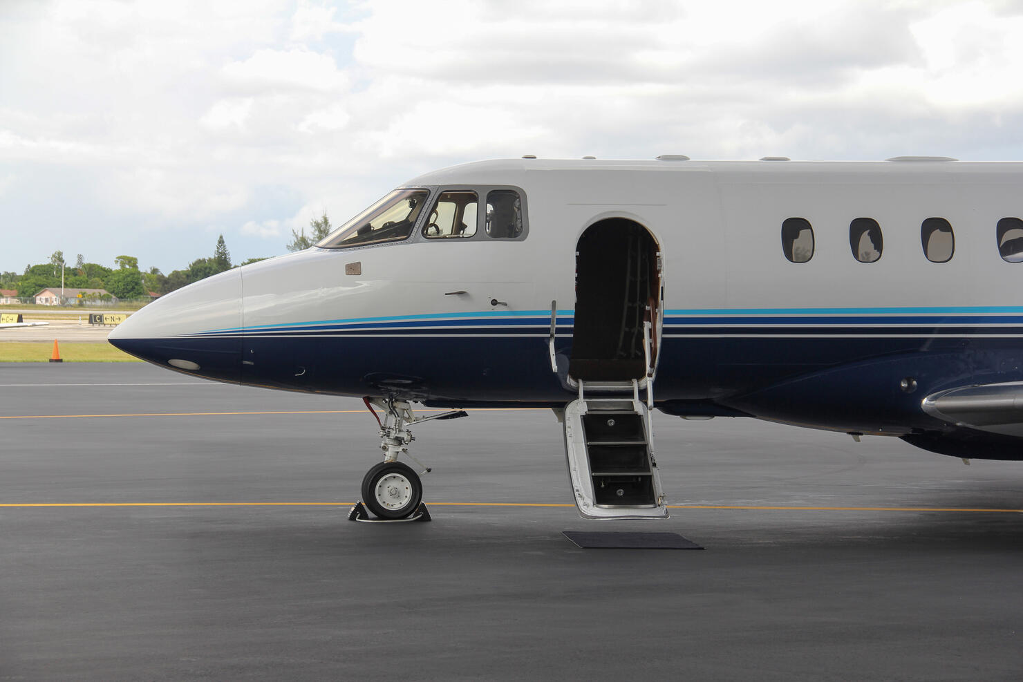 Private jet parked at terminal