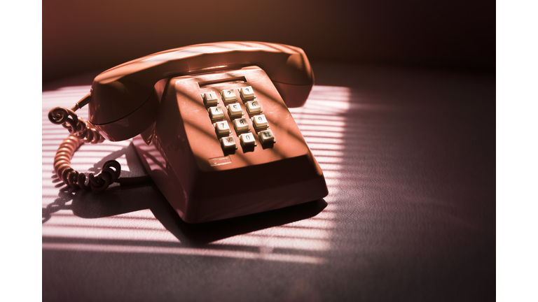 Red Telephone On Table At Home