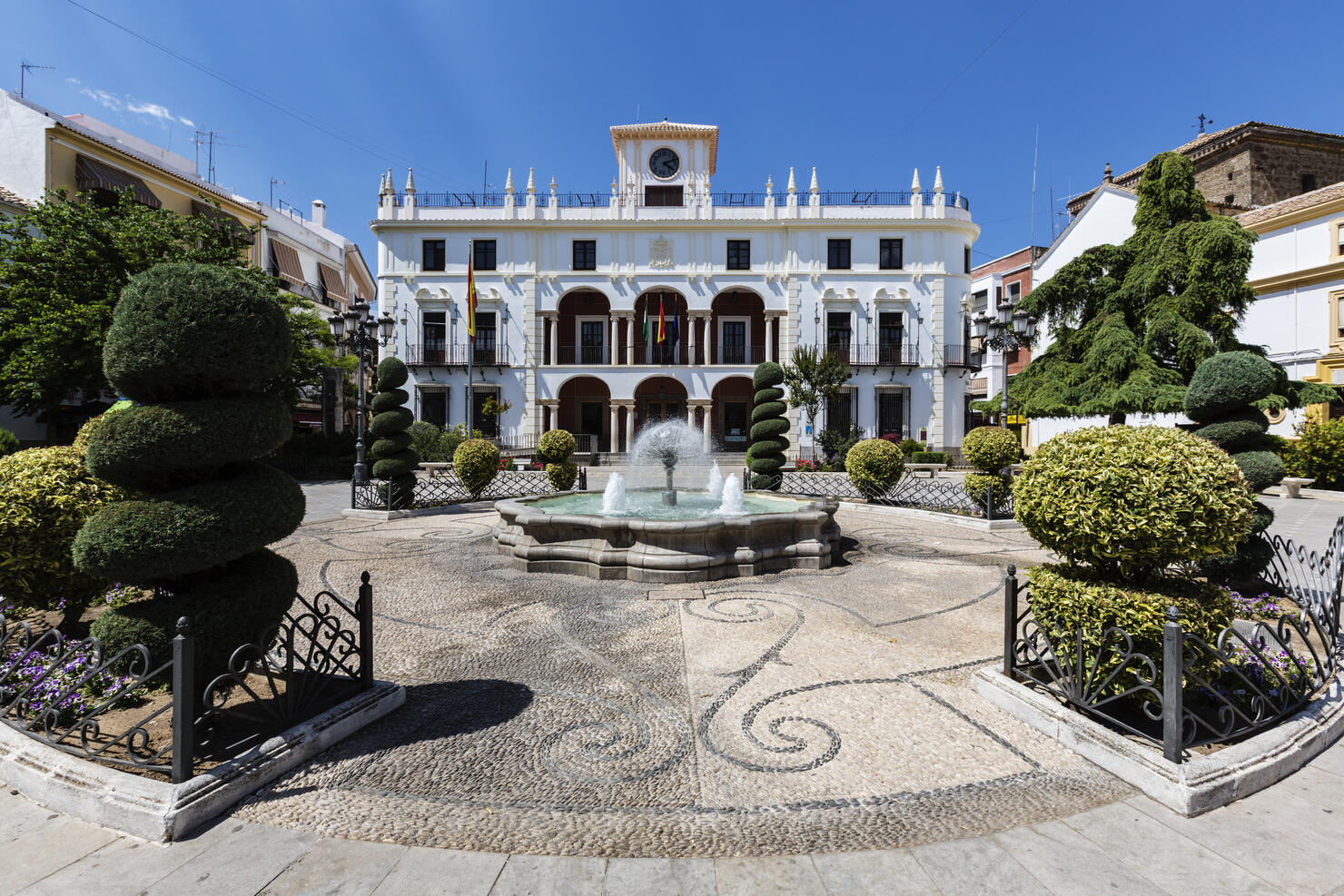 Mansion and courtyard with fountain and shrubs, Priego de Cordoba, Andalusia, Spain