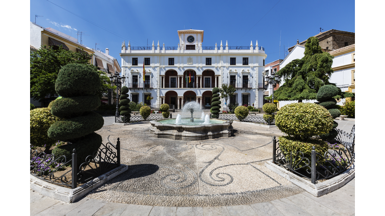 Mansion and courtyard with fountain and shrubs, Priego de Cordoba, Andalusia, Spain