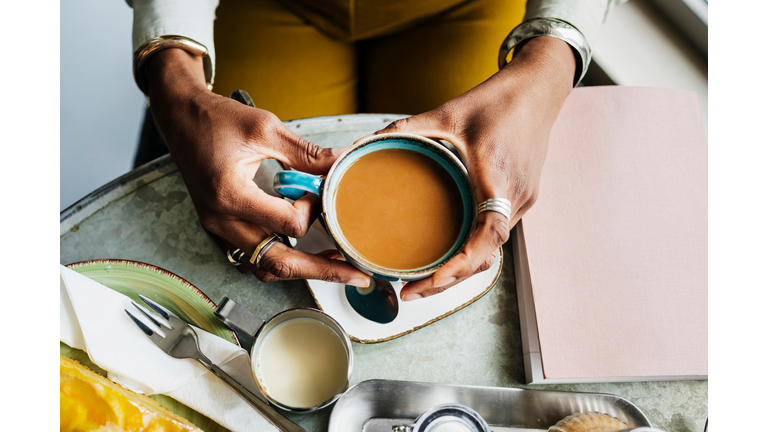 Aerial View Of Woman Drinking Coffee
