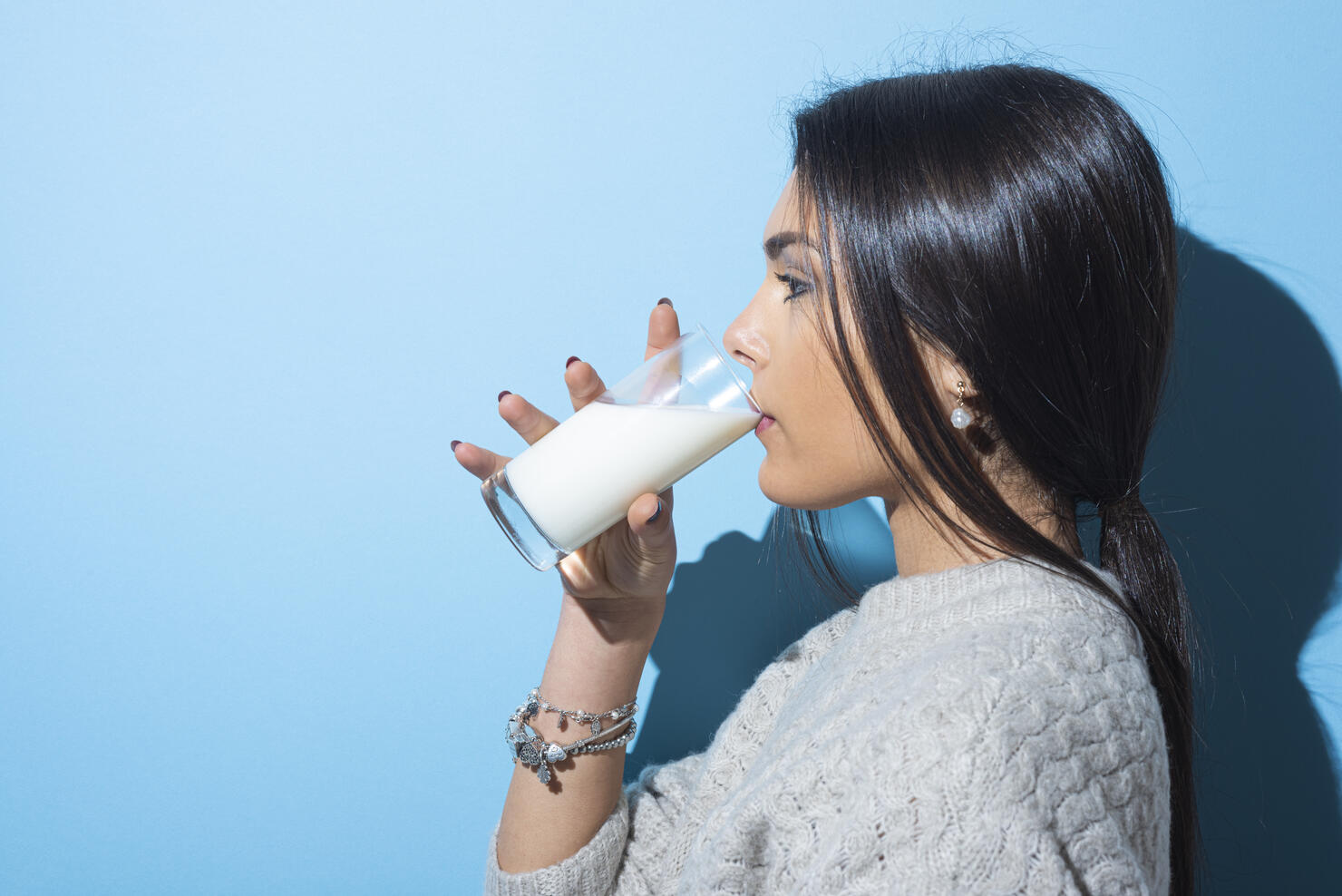 Young women drinking milk