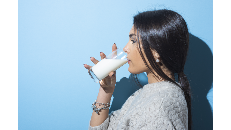 Young women drinking milk