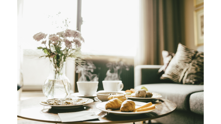 Breakfast served on table in hotel room