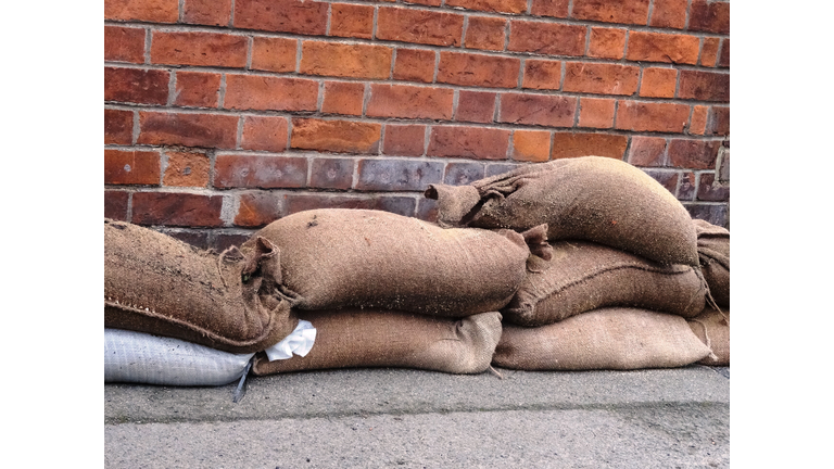 Sandbags Against Brick Wall