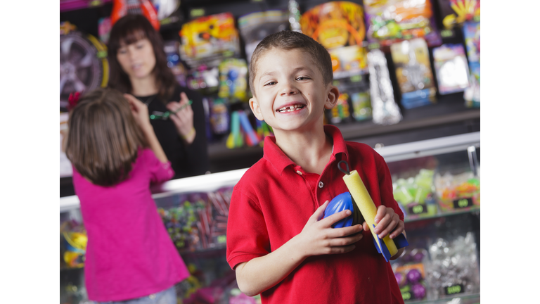 Happy Little Boy with Prizes