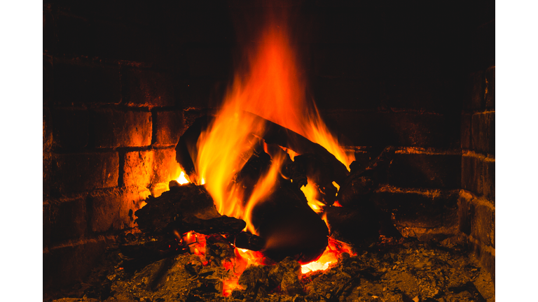 Burning Firewood In Fireplace