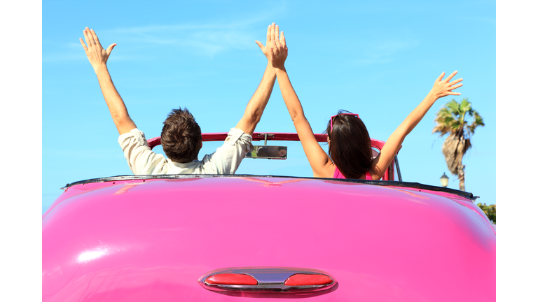 Freedom - happy free couple in car