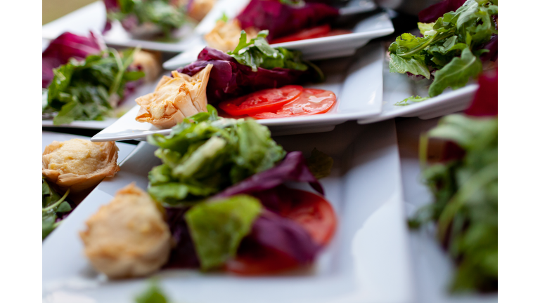 Salads with lettuce and tomato on plate