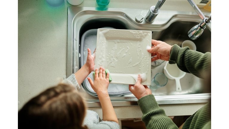 Getting their dishes sparkling clean