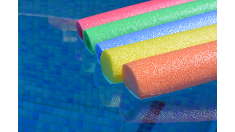 Close-Up Of Noodle Floats On Swimming Pool