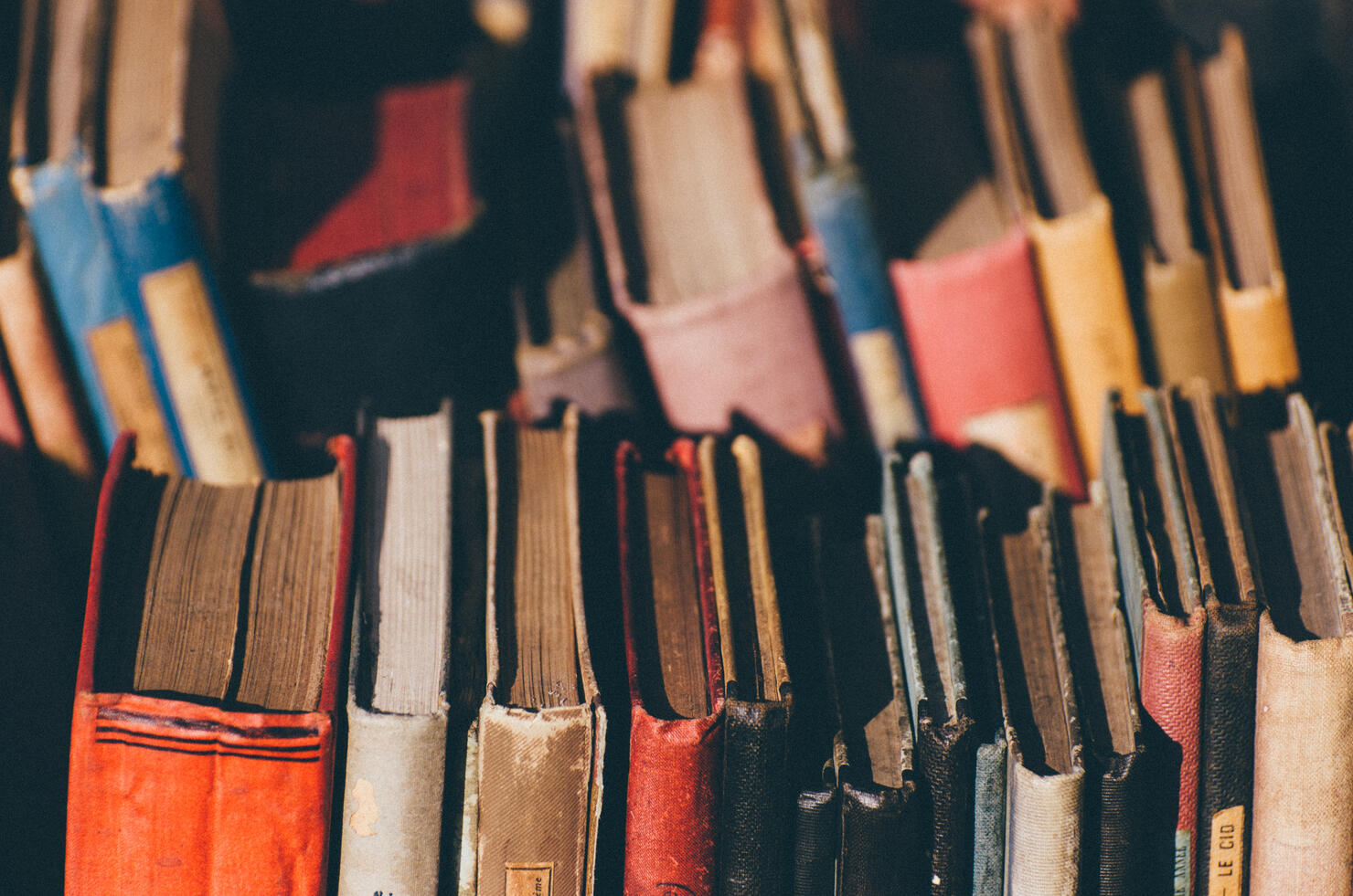 Full Frame Shot Of Multi Colored Old Books For Sale