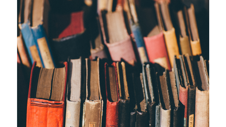 Full Frame Shot Of Multi Colored Old Books For Sale