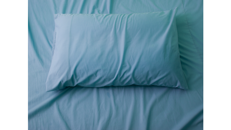 High Angle View Of Pillow On Bed