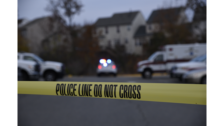 Crime scene with a marked police cruiser