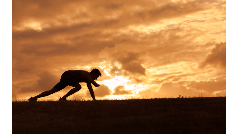 Male runner timing his run