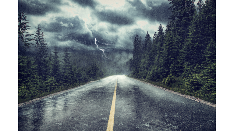 Storm with rain and lightning on the street