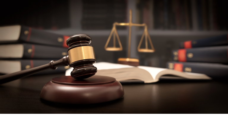 Judge gavel and scale in court. Legal concept