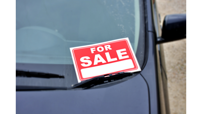 Car with For Sale Sign