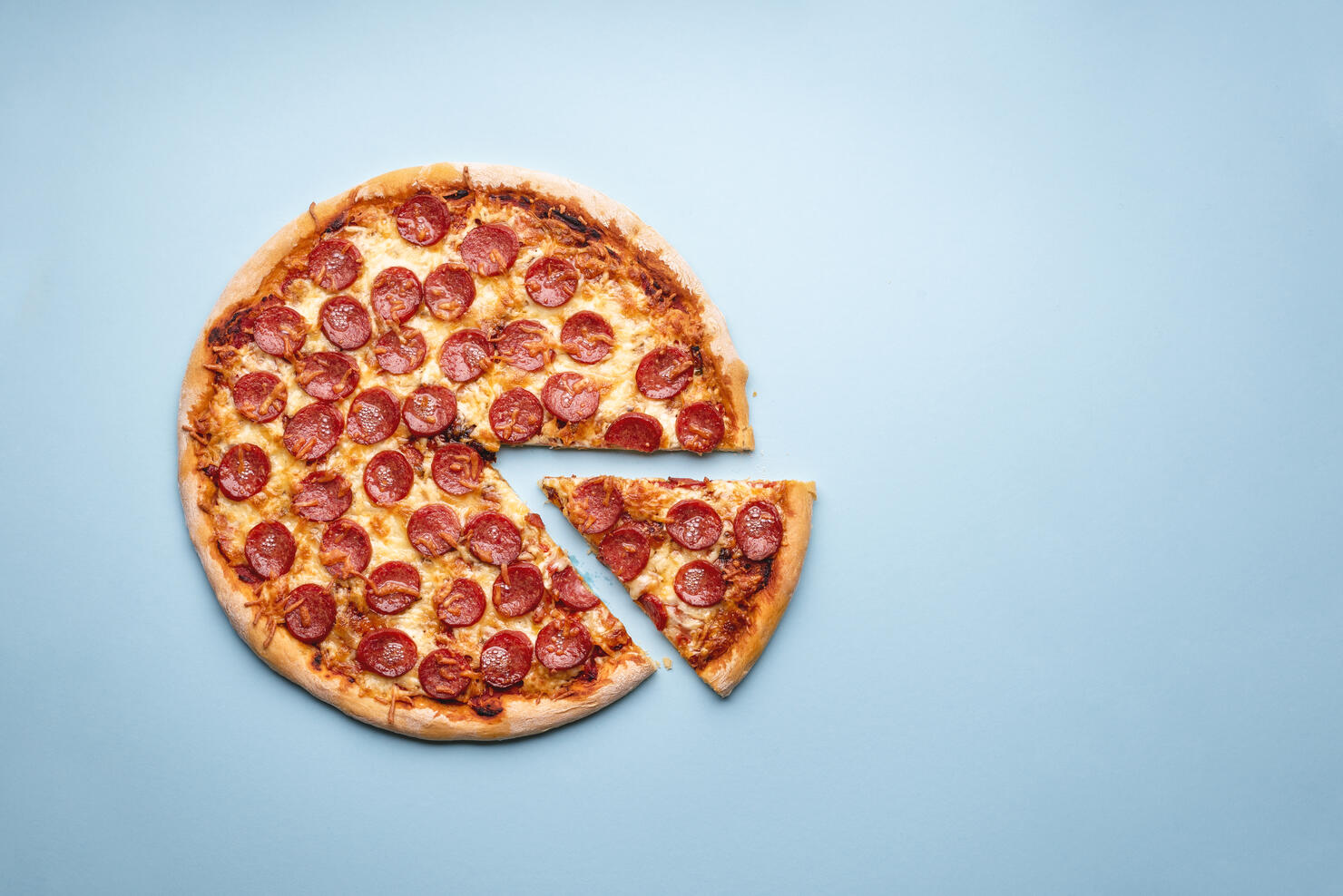 Pizza pepperoni above view. Homemade pizza.