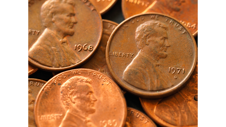 many one cent coins with the portrait of Abraham Lincoln - 1