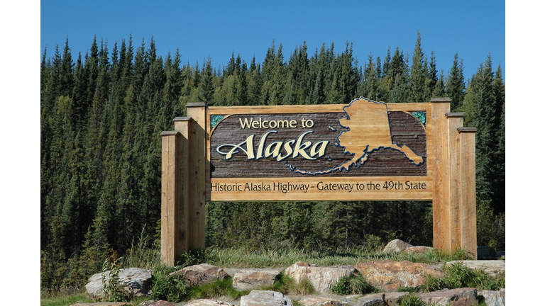 Welcome panel on the Alaska Highway at the Alaskan border