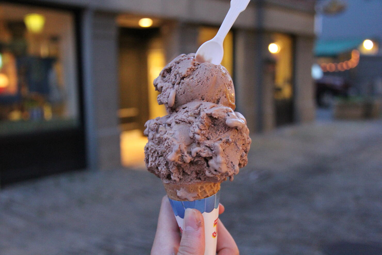 Cropped Image Of Person Holding Chocolate Ice Cream Cone