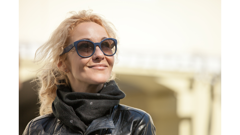 outdoors portrait of a 45 year old woman