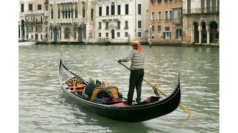 Police solve the mystery of why Venice's Grand Canal turned bright green