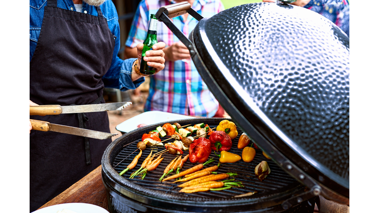 Close up of vegetables cooking on barbecue