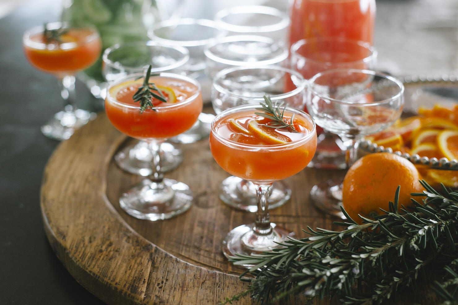 orange gin and tonic cocktails with rosemary