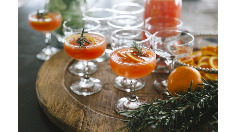 orange gin and tonic cocktails with rosemary