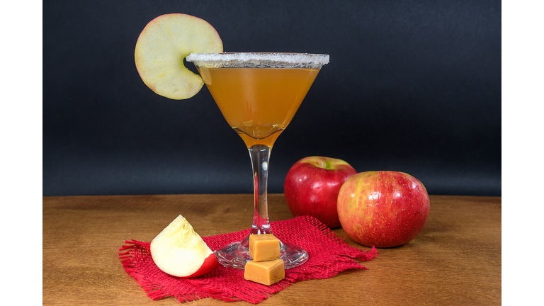 apple cider cocktail with caramel candy