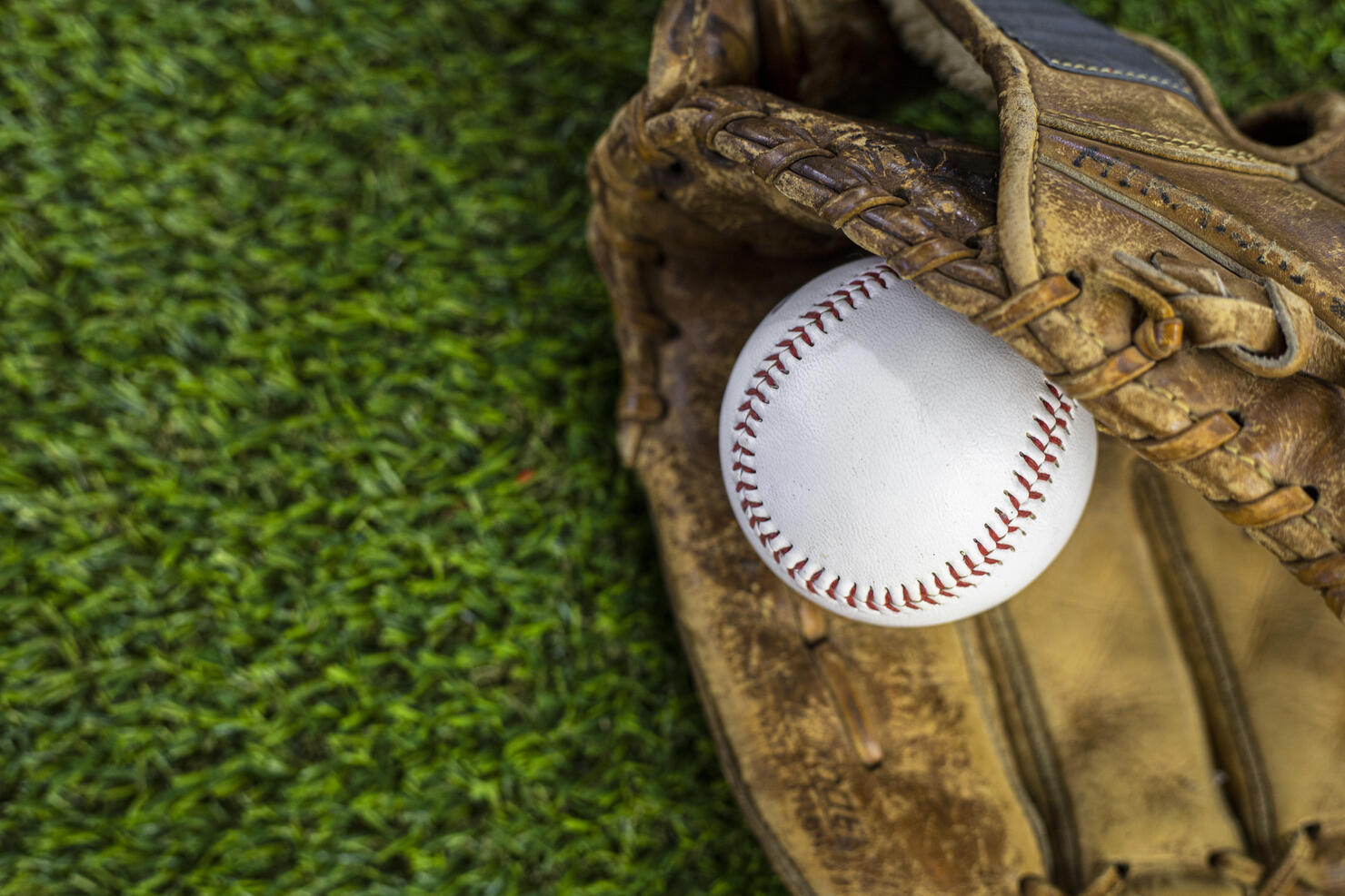 Baseball on the green grass