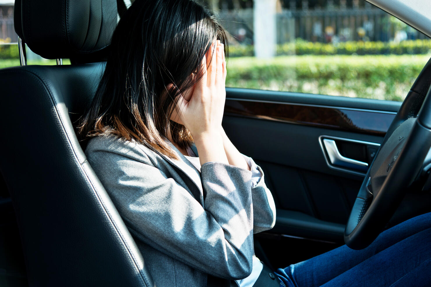 Sad businesswoman driver sitting in car