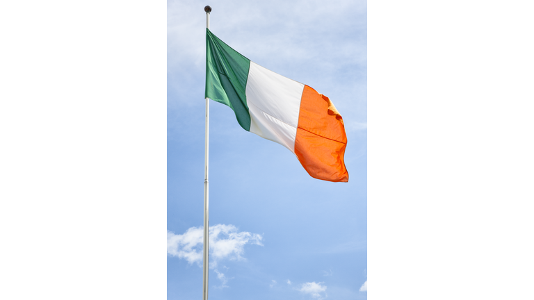 Irish Flag against a Blue Sky