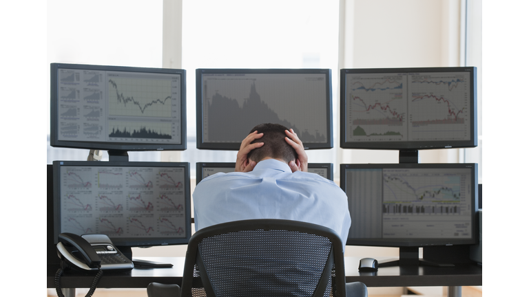 Frustrated male trader at work