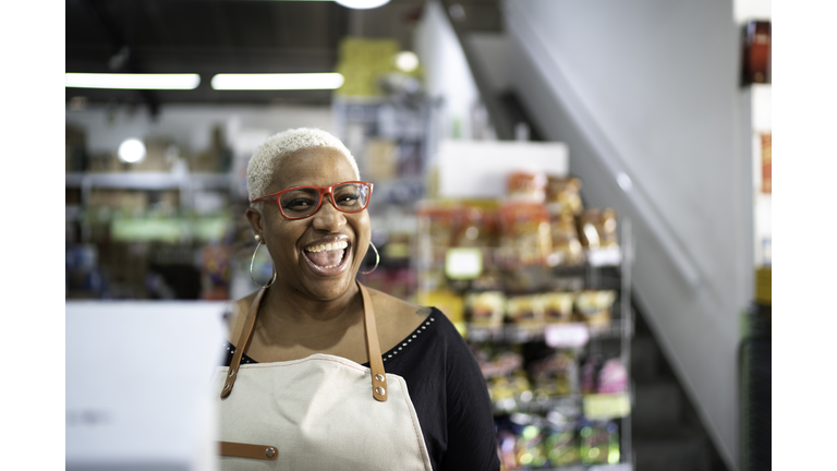 Happy cashier working at wholesale