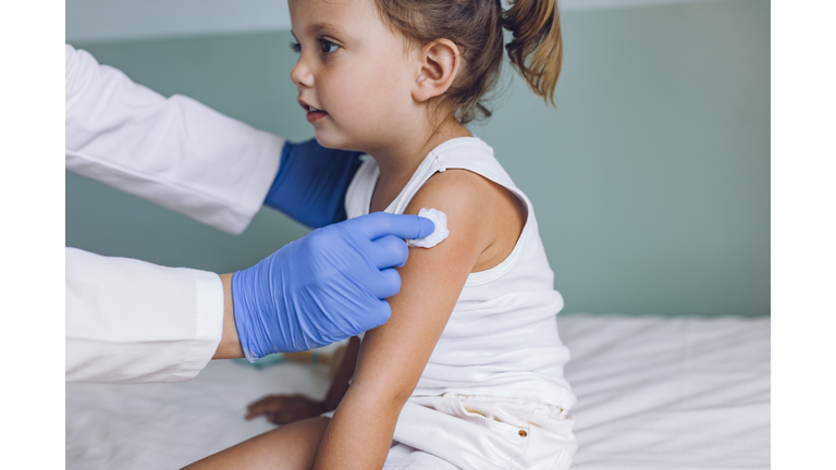 Young Girl Getting a Flu Vaccine at a Hospital