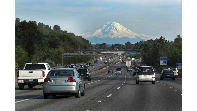 Commuters in Seattle drive toward Mt Rainier on Interstate 5