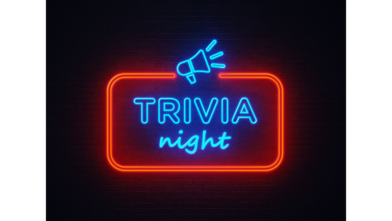Trivia Night Shaped Neon Light On Black Wall