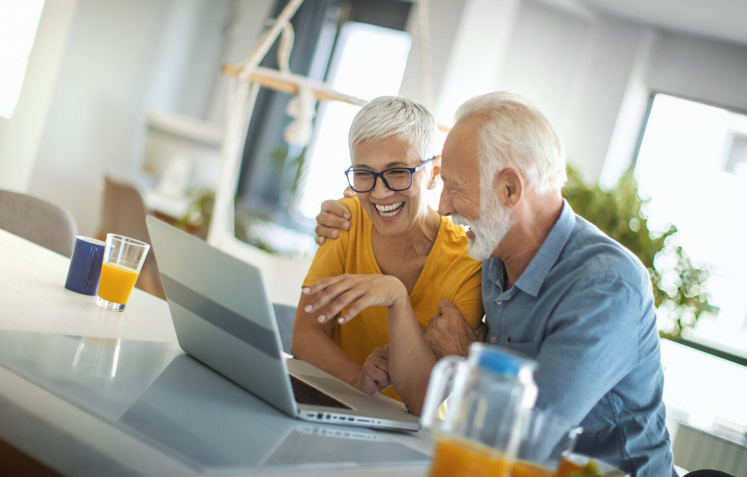Mature couple buying some goods online
