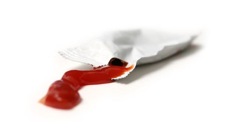 Ketchup on white background