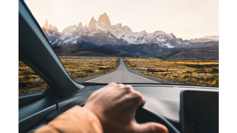Personal perspective of man driving a car in Patagonia, Argentina